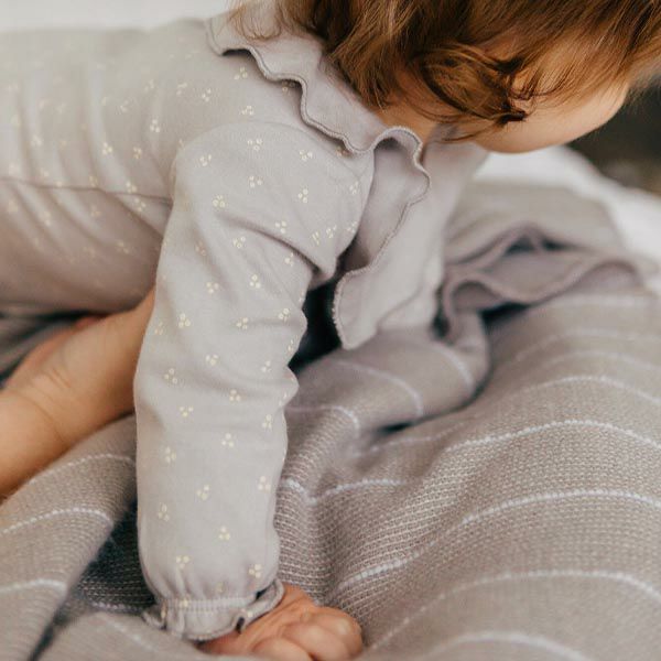 オーガニックコットン ベビーラッフルボディスーツ(長袖)