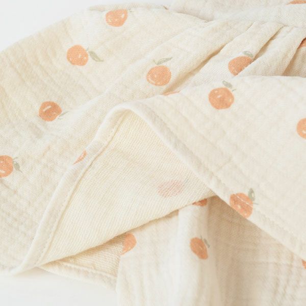 オーガニックコットン ベビーノースリーブスカート付きロンパース