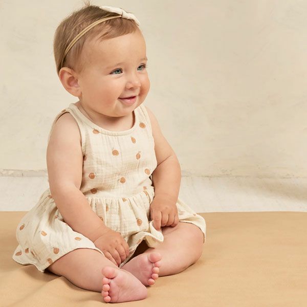 オーガニックコットン ベビーノースリーブスカート付きロンパース